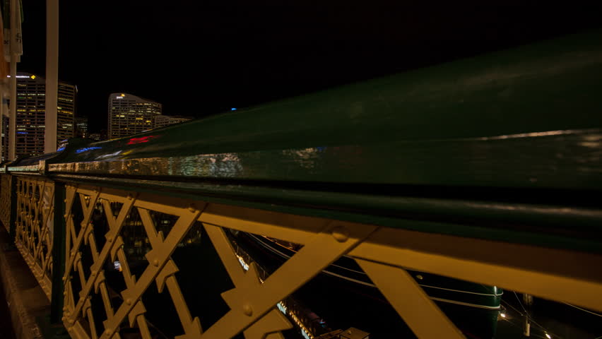 Time lapse moving up from rail to reveal city harbor