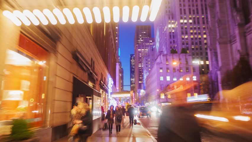 NEW YORK CITY - NOVEMBER 2016: Hyperlapse walk along East 50th Street and Madison Avenue toward  Christmas Tree at Rockefeller Center in New York City, USA