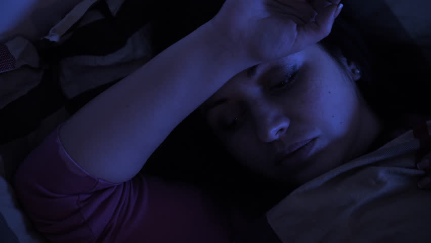 Woman has insomnia, thinking about her problems, can not sleep. Deep night Royalty-Free Stock Footage #1025809898