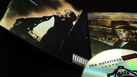 Rome, Italy - March 16, 2019:  Collection of covers and cd inserts of the singer Tupac Shakur and NOTORIUS BIG. Protagonists of the battle between the opposing factions of the hip hop of the 90s