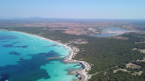 Colonia Sant Jordi, Spain. Amazing drone aerial landscape of the charming beaches Estanys and Es Trencs. Turquoise caribbean sea
