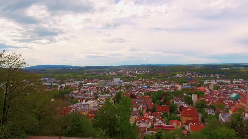 Panoramic view of Ravensburg and Weingarten at daytime, Baden-Wurttemberg, Upper Swabia, Germany - View from Veitsburg Castle over the Old Town. Panning Shot.