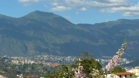 Panning view of Caracas city Valley with El Avila mountain,Venezuela. With a population of more than 4 million people is a sprawling metropolis choked with traffic and violence. Cerro El Avila.