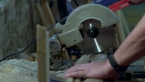 Circular saw. Industrial hand circular saw. saw at work.