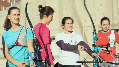Madrid, Spain. 10/04/2017. Members of the spanish archery team training while national coach modifies technique.