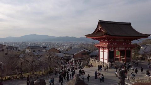 KYOTO, JAPAN - MARCH 18, 2019 : Crowds of locals and international tourists at Kyoto City's famous Kiyomizudera Temple, which is a Historic Monuments of Ancient Kyoto UNESCO World Heritage site. 