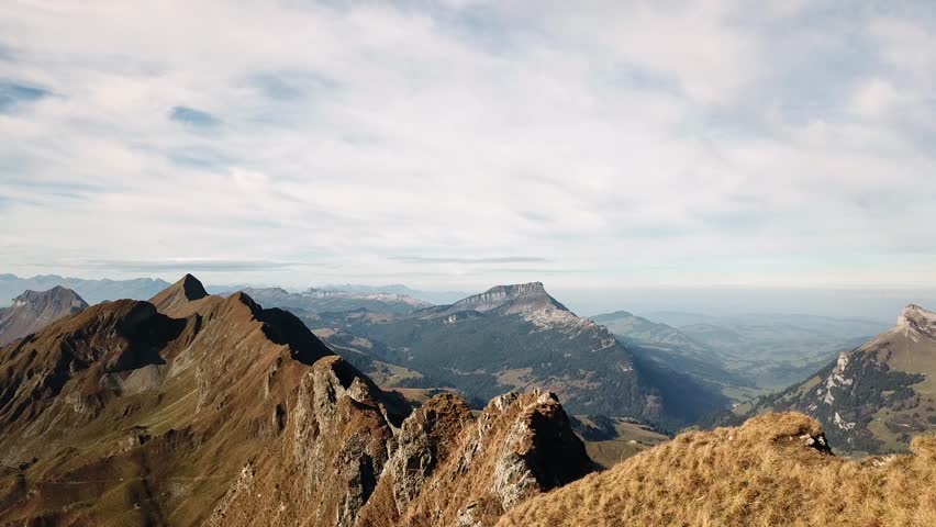 Drone flying along alpine summits in summer in Switzerland 4k | Shutterstock HD Video #1025869448