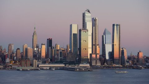 The mixed-use Hudson Yards real estate development and other buildings on the West Side of Manhattan in New York City at sunset.