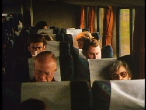 CENTRAL ILLINOIS, 1994 Interior coach on Amtrak's California Zephyr, four people