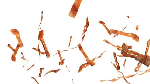 Fried bacon flying in slow motion against white