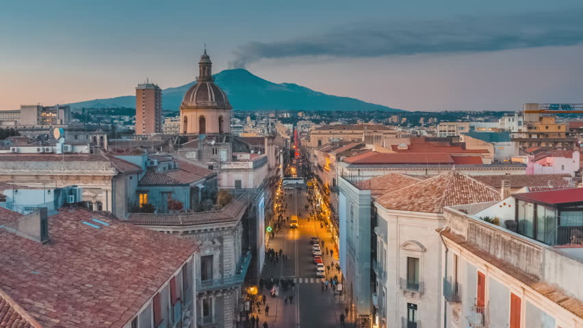 Dome of Catania and the main street with the background of volcano Etna, Sicily, Italy Royalty-Free Stock Footage #1025907113