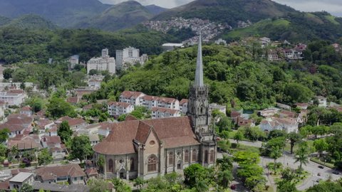Aerial circle l shot of Petropolis Cathedral and city, Brazil