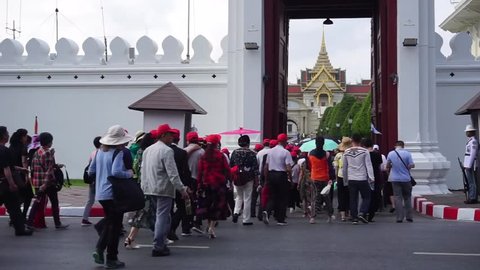 Chinese tourists walk into Phra Kaew Temple
