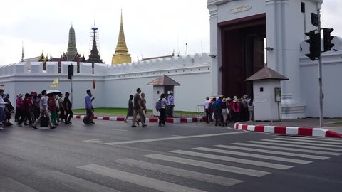 Chinese tourists walk into Phra Kaew Temple
