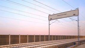 hannover train station signboard,train travels under railway billboard