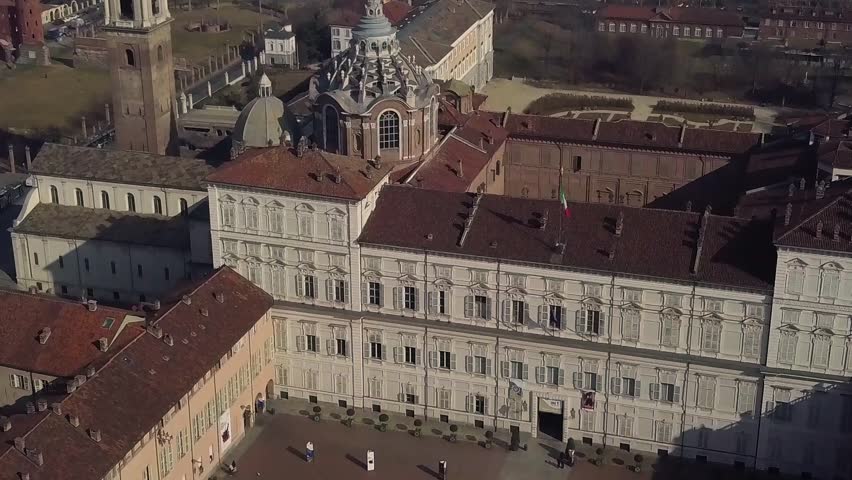 4k drone Air view of old city centre of Turin, Italy with smog over it