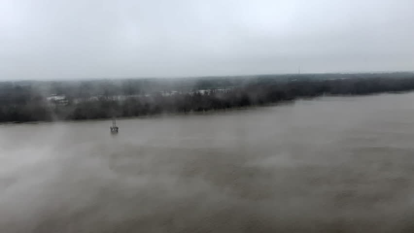Mississippi River bayou in early morning fog with copy space