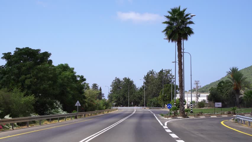 Deserted highway in Israel on Yom Kippur. Jewish Day of Atonement - no people and no cars around on empty road