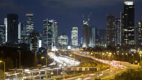Tel Aviv Skyline and Ayalon Freeway At Night, Israel,  Traffic Time lapse