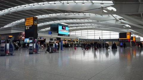 HEATHROW AIRPORT, LONDON - MARCH 16, 2019: The land side departures concourse of British Airways Terminal 5 at Heathrow International Airport in London, UK.