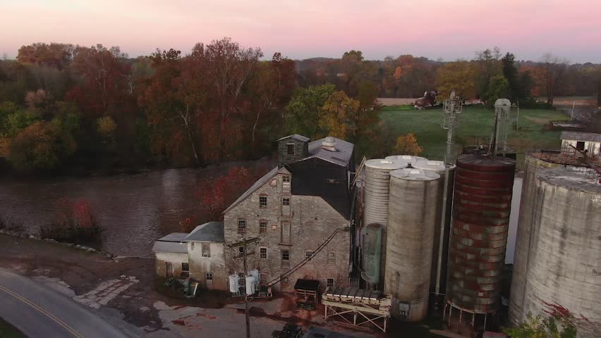 Traditional stone masonry dam electrical generator, morning twilight