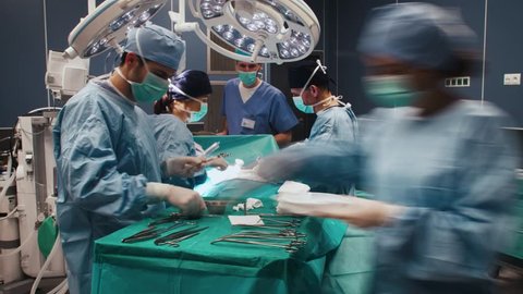 Time lapse view of difficult operation of busy surgeons