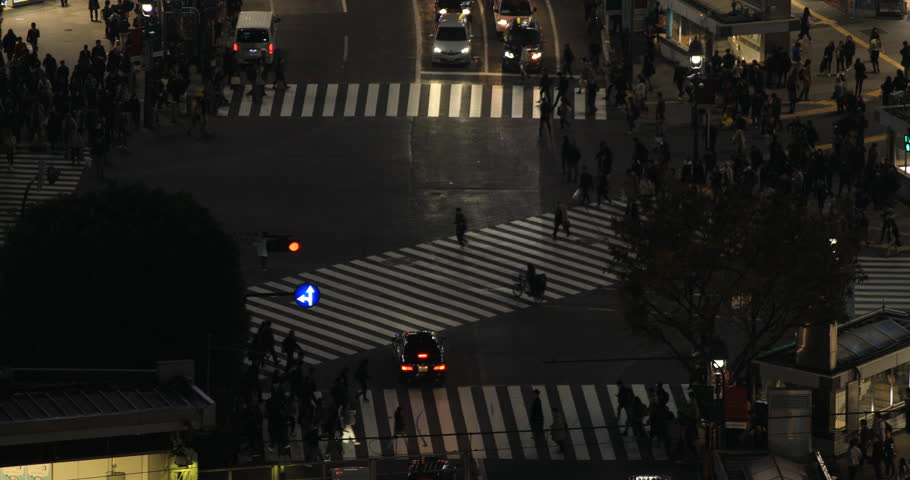 Many peole and car at the crossing in the city. Shibuya ward Tokyo Japan - 12.03.2018 : It's a famous crossing in Tokyo. camera : Canon EOS 5D mark4a