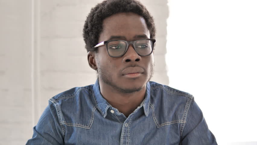 Pensive African Man Thinking an Idea
