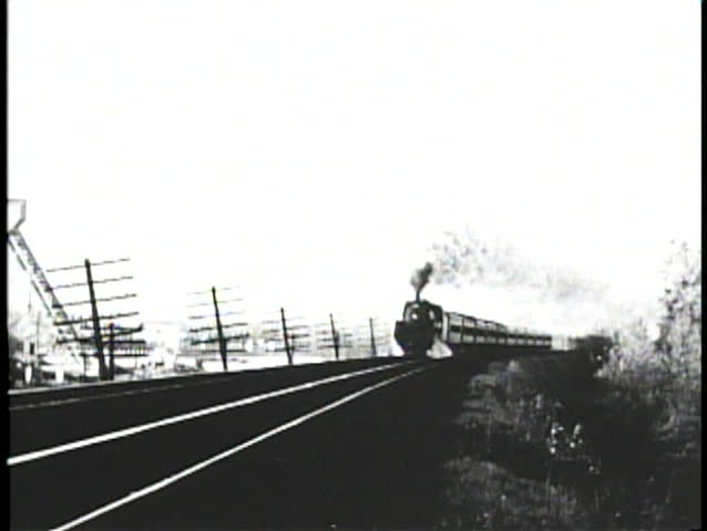 NEBRASKA PRAIRIES, 1905, Archival footage of steam locomotive passing in winter