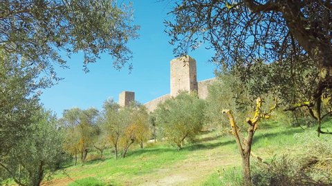 Siena, Italy: Panning gimbal panorama of medieval village of Monteriggioni within the defensive walls in Tuscany; architecturally significant, referenced in Dante Alighieri's Divine Comedy