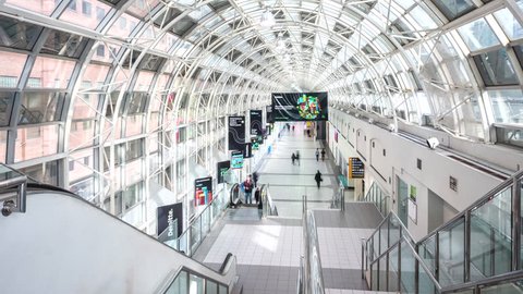 Toronto, Canada - October 24, 2018: Time lapse view of people crossing the Path SkyWalk connecting Union Station to the CN Tower and Rogers Centre in Downtown Toronto, Ontario, Canada.