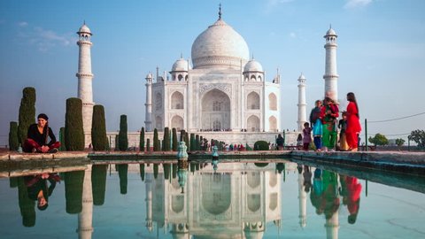 Agra, India - February 21, 2019: Time lapse view of tourists at the Taj Mahal in Agra, Uttar Pradesh, India. 