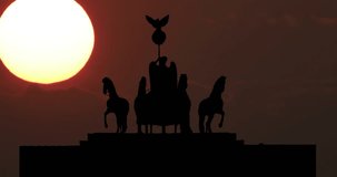 Brandenburg Gate in Berlin Germany Silhouette Timelapse at Sunset. Landmark