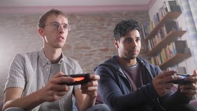 Avid Gamer Young Adult Friends Casually Playing Video Games Together