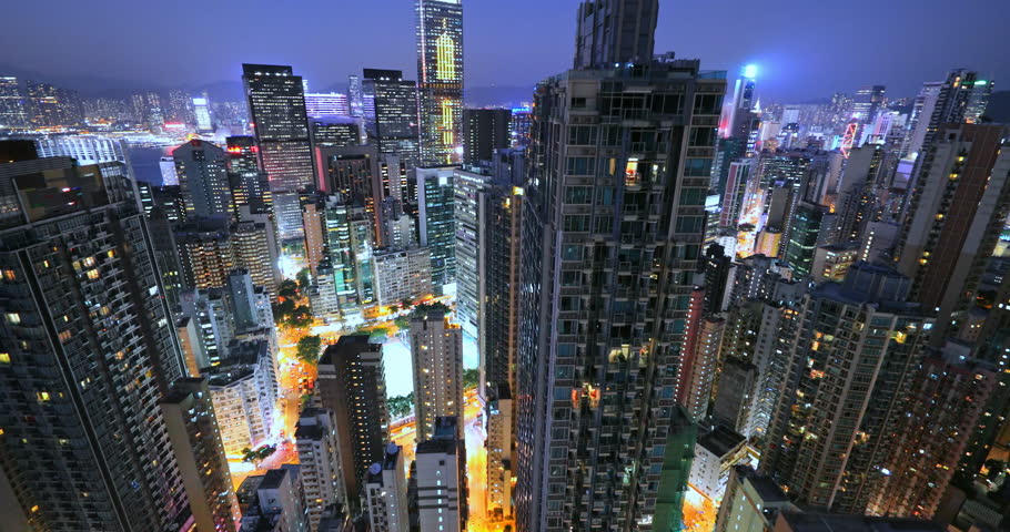 Hong Kong, China 4 SEP 2018: Hong Kong futuristic architecture and urban cityscape aerial 4K panorama. Modern city at night video background | Shutterstock HD Video #1026050009