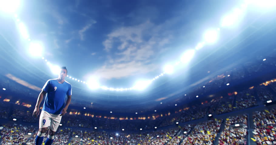 Soccer player succeed in making a strong kick with his feet while jumping horizontally. The player is wearing unbranded soccer uniform. The stadium and crowd are made in 3D and animated. Royalty-Free Stock Footage #1026070787