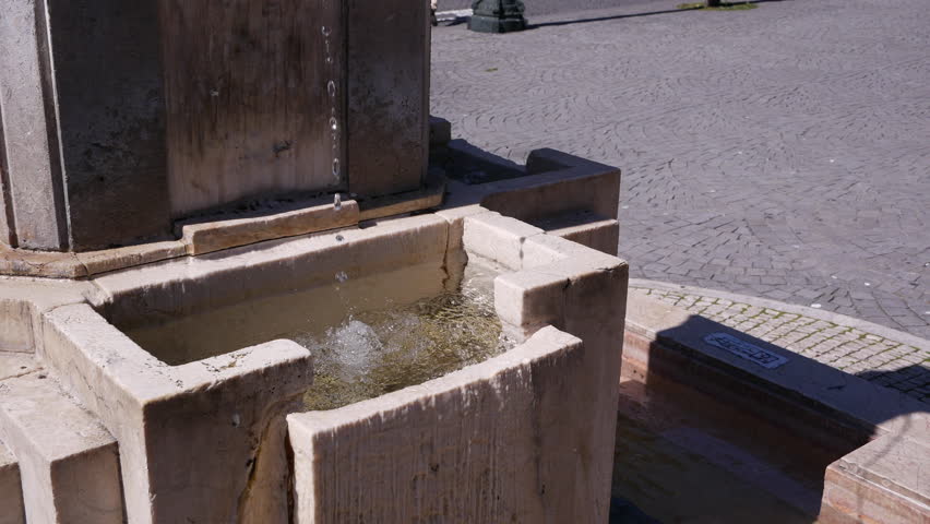 Close up of water dripping in fountain with high shutter speed. Fountain of Youth, Avenida dos Aliados, Porto, Portugal.
