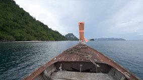 Point of view from longtail boat in Thailand on Island hopping tour, view of Chicken Island in Krabi province