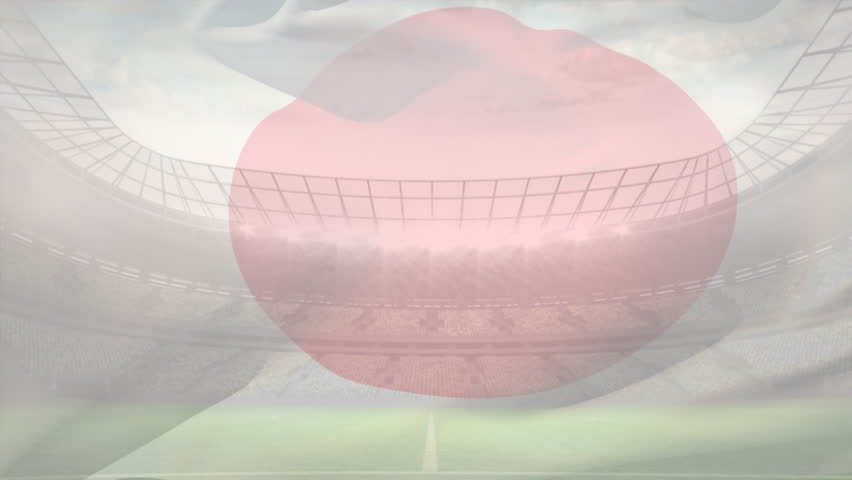 Digital composite of handsome Caucasian rugby player running with the football while being tackled by African American rugby player and Japanese flag moving on the foreground in football stadium