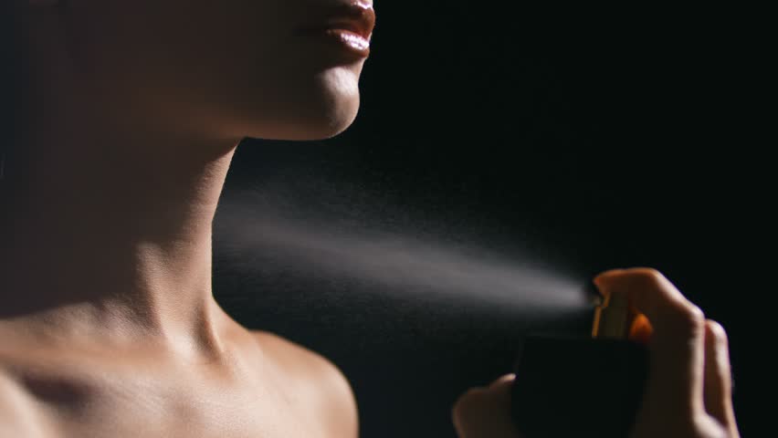 Young Woman Spraying Perfume On Her Stock Footage Video 100 Royalty