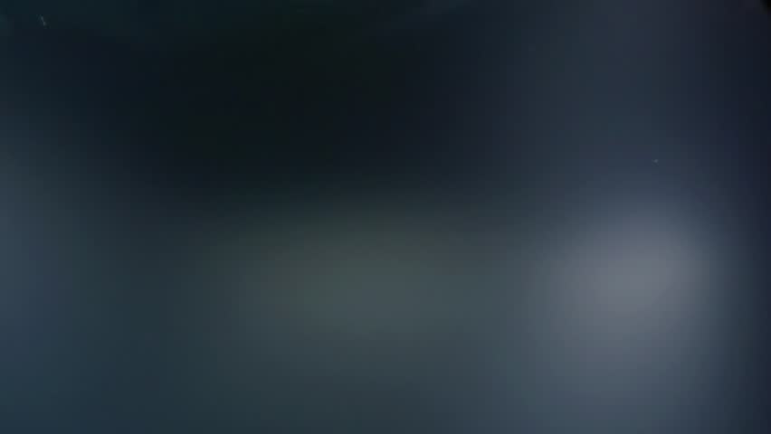 man is falling inside water, underwater view, splashes are flying around, he is drowning