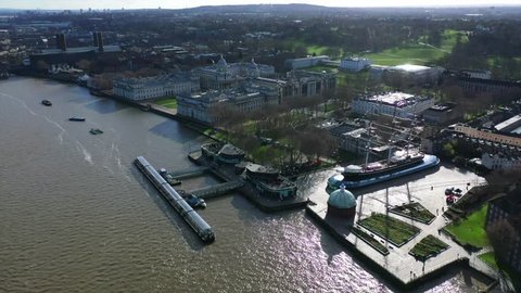 Aerial drone video of famous Cutty Sark the only tea clipper survived and used as a museum next to Greenwich pier in the heart of London, United Kingdom
