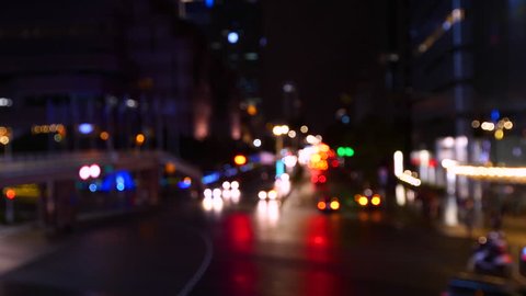 4K video colorful bokeh / blur from car traffic at the intersection in the night at Xinyi Road in Taipei, Taiwan