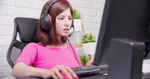 Young asian esport gamer girl feel angry while playing in Online Video Game because of internet is down