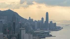 Hong Kong city motion time lapse scene of sunset victoria harbour peak central of town urban area 4k video