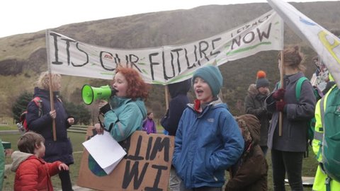 Edinburgh, Scotland - March 15 2019: Fridays for the future, Children Chanting "Hey ho - Climate change has got to go"