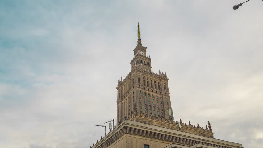 Time lapse of the spire of Palace of Culture and Science, historic high-rise building in the centre of Warsaw, Poland