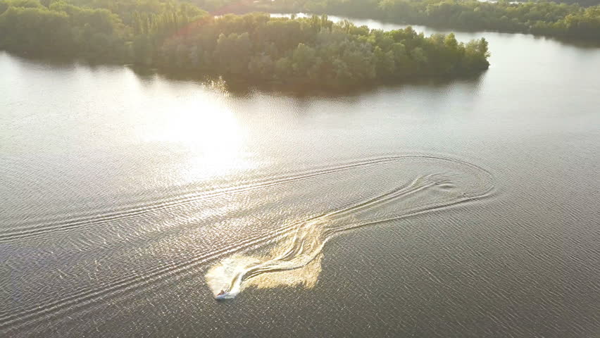 4K  Aerial. Water bike on  lake surface. Summer  entertainment