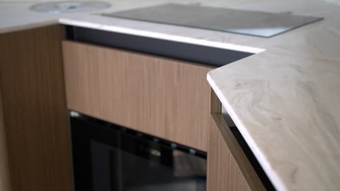Detail of the marble counter top in the kitchen of a yacht
