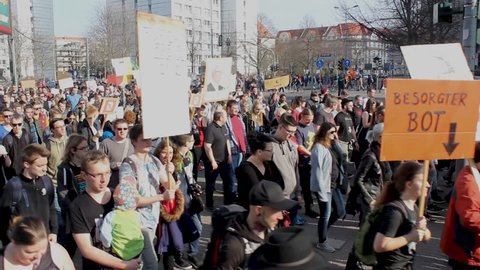 Erfurt, Germany – Mar. 23,2019: walking german sign slogan protest march demonstration against new copyright law “Artikel 13”. Protester got called bots by CDU. More than 100.000 protesters in Germany